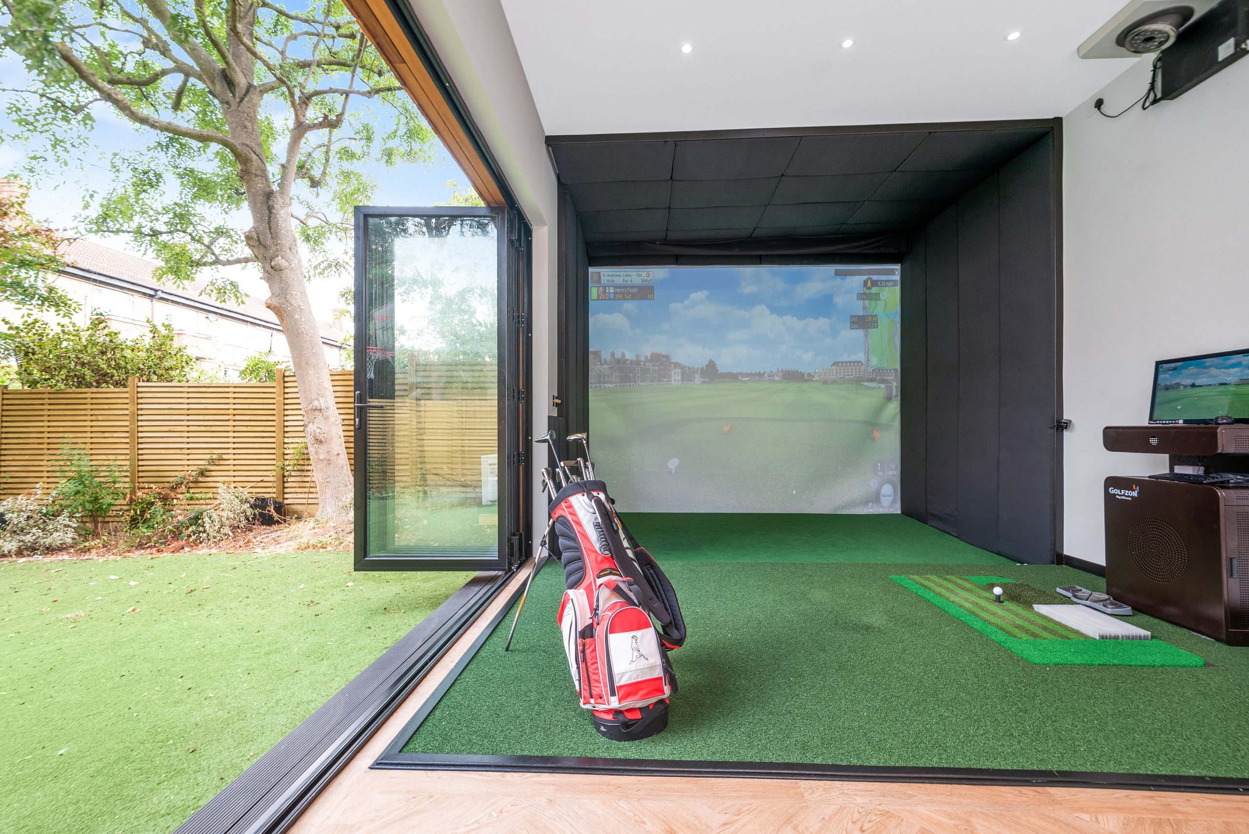 Golf simulator garden room in London