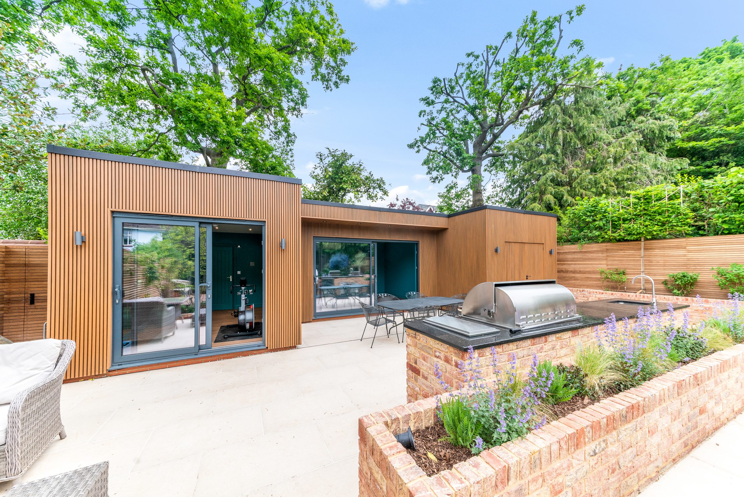 garden room with bbq and patio